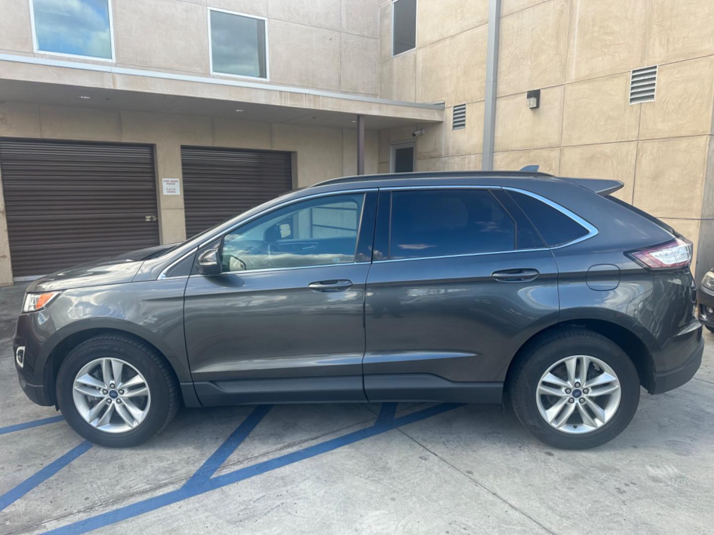 2016 Gray /Black Ford Edge SEL AWD (2FMPK4J93GB) with an 2.0L L4 DOHC 16V engine, 6A transmission, located at 30 S. Berkeley Avenue, Pasadena, CA, 91107, (626) 248-7567, 34.145447, -118.109398 - Low Miles! - Photo#1